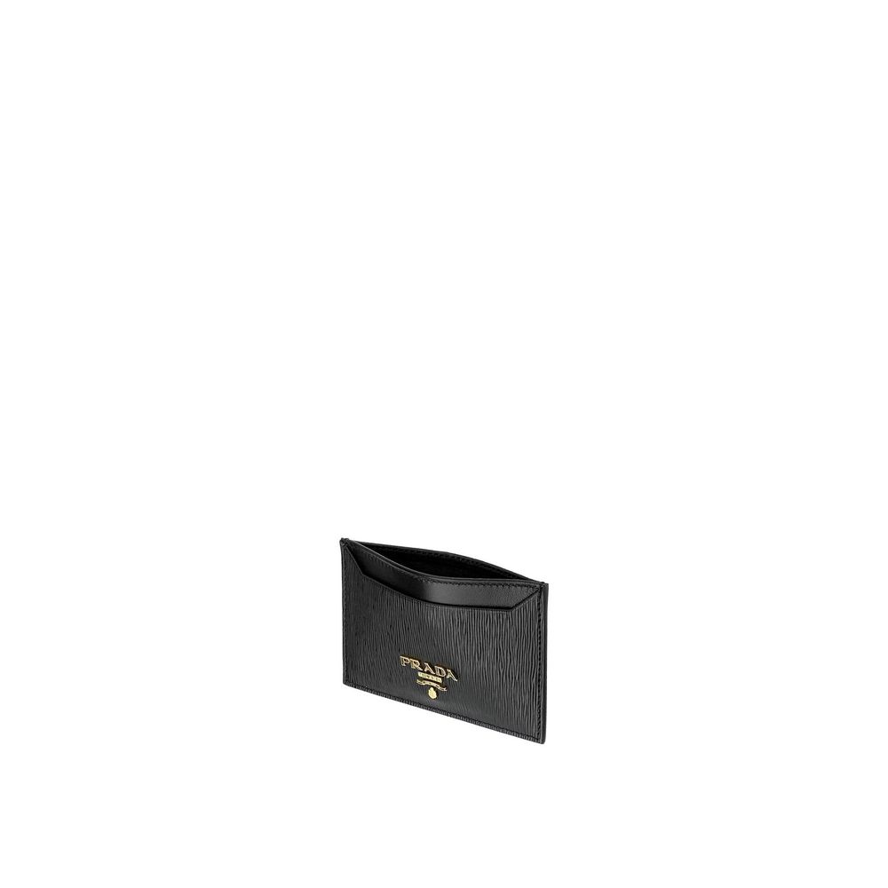 Black Calfskin WalletDescription: – Composition: 100% calf leather – Lining: Leather – Front logo lettering – Width 1 cm – Length 10,5 cm – Height 7 cm – Made in Turkey – Gender: WOMEN –Black Calfskin Wallet${tagsPradaAulae Black Calfskin Wallet PradaAula