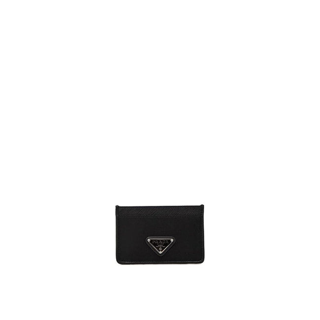Black Nylon CardholderDescription: – Composition: 100% Nylon – Lining: Leather – Leather detail – Textured leather – Width 1 cm – Length 10,5 cm – Front enamelled metal triangle logo – Height 7 cm – Made in Turkey – Gender: WOMEN –Black Nylon Cardholder${