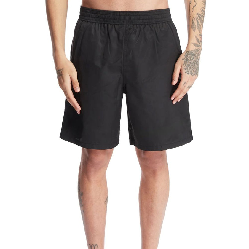 Black Polyester Swim ShortsDescription: – Composition: 100% Polyester – Elasticated waist – Two side pockets – Contrast logo print – Straight cut – Drawstring waist – Mesh lining – Shaped rear pocket – Made in Italy – Gender: MEN –Black Polyester Swim Sho