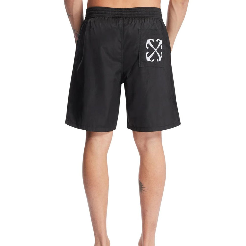 Black Polyester Swim ShortsDescription: – Composition: 100% Polyester – Elasticated waist – Two side pockets – Contrast logo print – Straight cut – Drawstring waist – Mesh lining – Shaped rear pocket – Made in Italy – Gender: MEN –Black Polyester Swim Sho