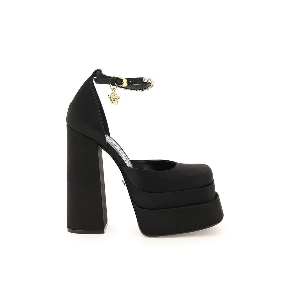 Black Silk Platform PumpsDescription: – Composition: 100% Silk – Insole: Leather – Sole: Leather – Ankle side buckle fastening – Square toe – Crystal embellishments – Medusa charm – Heel 16 cm – Gender: WOMEN – Made in Italy –Black Silk Platform Pumps${ta