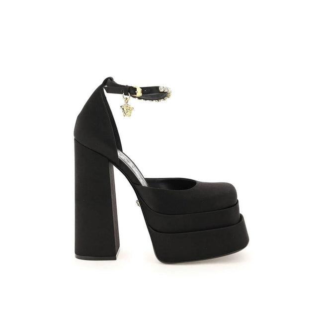 Black Silk Platform PumpsDescription: – Composition: 100% Silk – Insole: Leather – Sole: Leather – Ankle side buckle fastening – Square toe – Crystal embellishments – Medusa charm – Heel 16 cm – Gender: WOMEN – Made in Italy –Black Silk Platform Pumps${ta