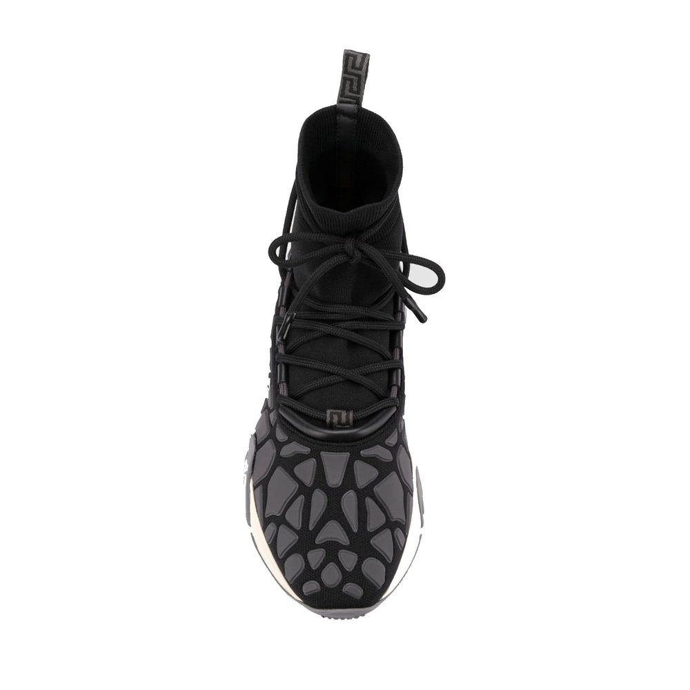 Black Fabric Athletic SneakersDescription: – Composition: Fabric – Rubber sole – Lace detailing – Relief logo detail – Made in Italy –Black Fabric Athletic Sneakers${tagsVersaceAulae Black Fabric Athletic Sneakers VersaceAulae Black Fabric Athletic Sneake
