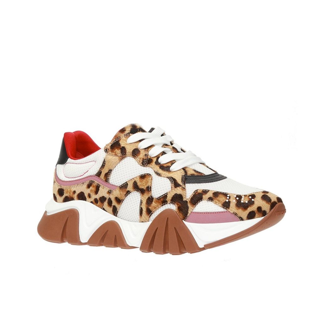Beige Leather Chunky SneakersDescription: – Composition: 100% leather – Mesh panels – Rubber Sole – Lace up fastening – Logo rubber lettering detail – Made in Italy –Beige Leather Chunky Sneakers${tagsVersaceAulae Beige Leather Chunky Sneakers VersaceAula