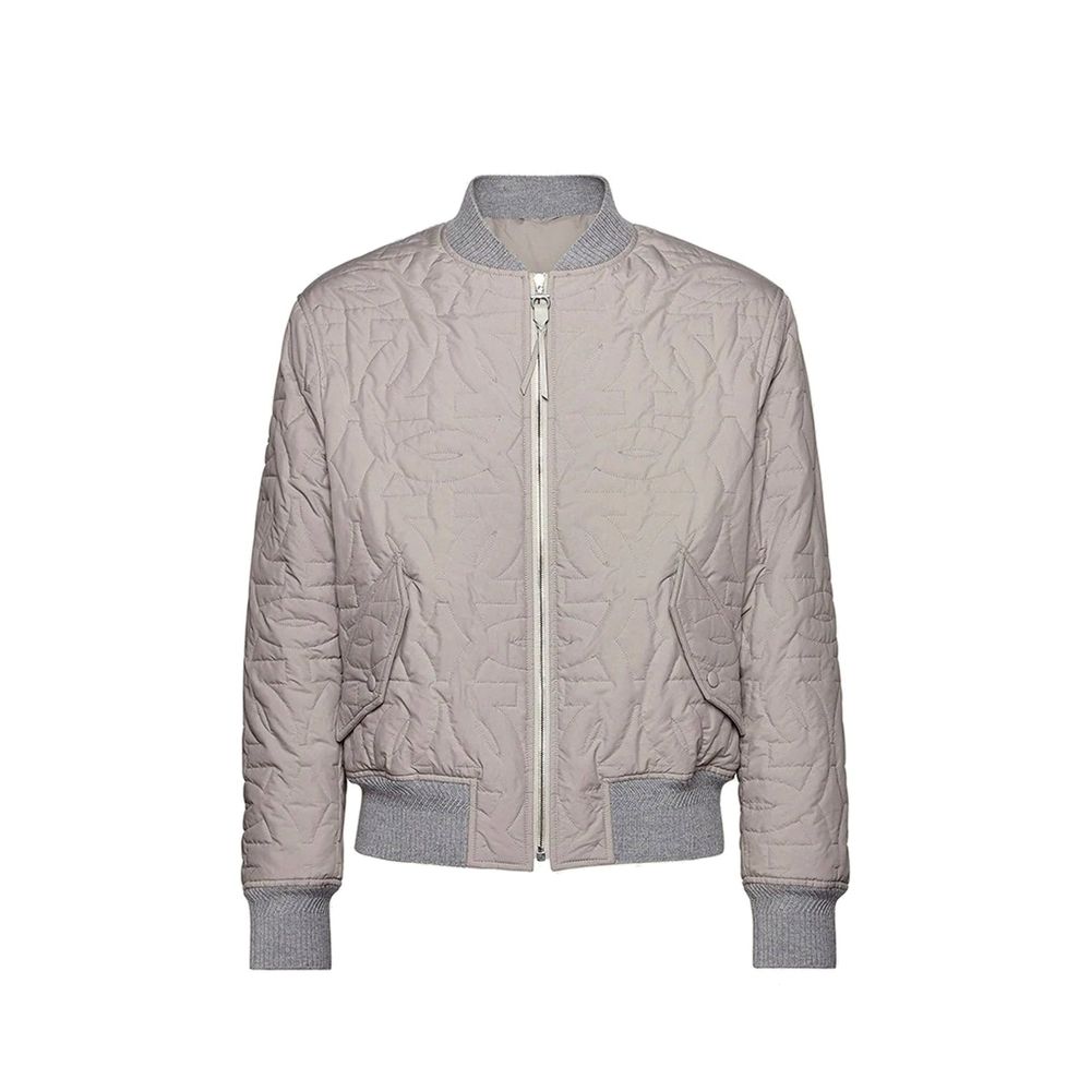 Gray Polyester BomberDescription: – Composition: 100% polyester – Long sleeves – Zip fastening – Ribbed trims – Side pockets with flap – Made in Italy –Gray Polyester Bomber${tagsSalvatore FerragamoAulae Quilted Bomber Jacket Salvatore FerragamoAulae Quil