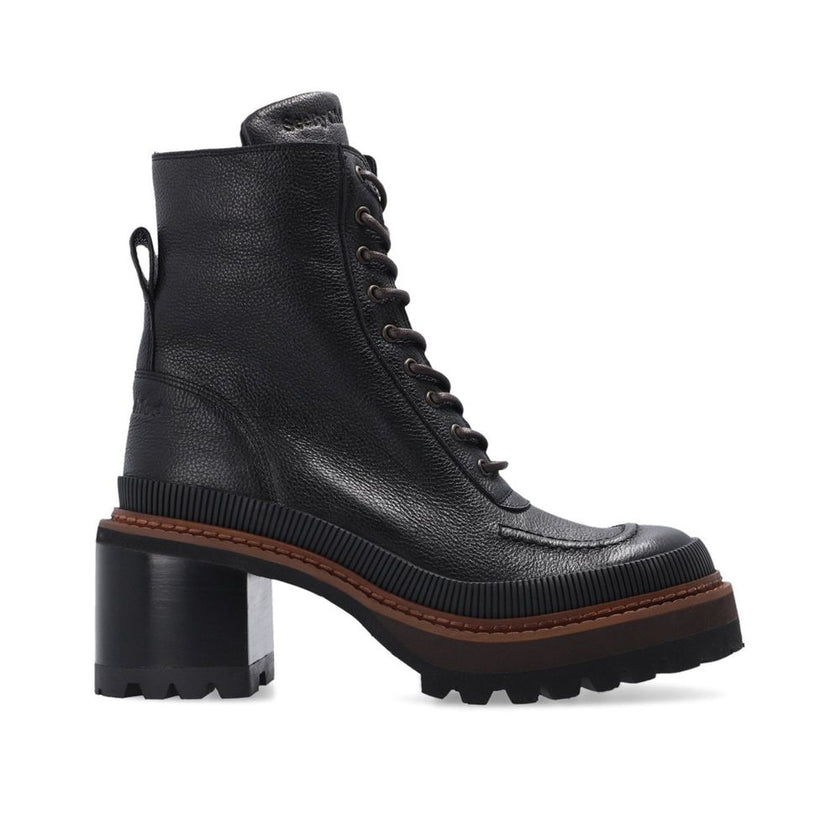Black Calfskin Lace-Up BootsDescription: – Composition: 100% calf leather – Leather lining and insole – Rubber sole – Textured black leather – Lace-up fastening – Side zip fastening – Back logo detail – Heel 7 cm / 2,75 in – Made in Spain –Black Calfskin