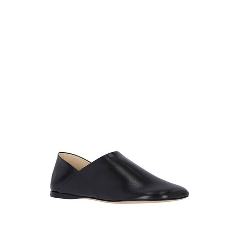 Black Lamb Leather Slip-On LoafersDescription: – Composition: 100% Lamb Leather – Inner: Leather – Insole: Leather – Sole: Leather – Square toe – Branded insole – Grained-effect – Slip-on design – Iconic petal shaped toe – Made in Italy – Gender: WOMEN –B