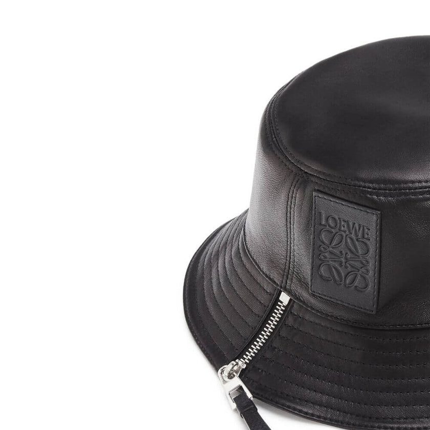 Black Calfskin Bucket HatDescription: – Composition: 100% calf leather – Lining: Cotton – Side zip closure – On-tone logo detail – Made in Portugal – Gender: MEN –Black Calfskin Bucket Hat${tagsLoeweAulae Leather Fisherman Hat LoeweAulae Leather Fisherman