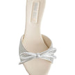 Silver Silk MulesDescription: – Composition: 100% Silk – Inner: Leather – Insole: Leather – Sole: Leather – Round toe – Open toe – Branded insole – Heel 9 cm – Open back – Crystal embellishment – Slip-on design – Top bow detail – Made in Italy – Gender: W
