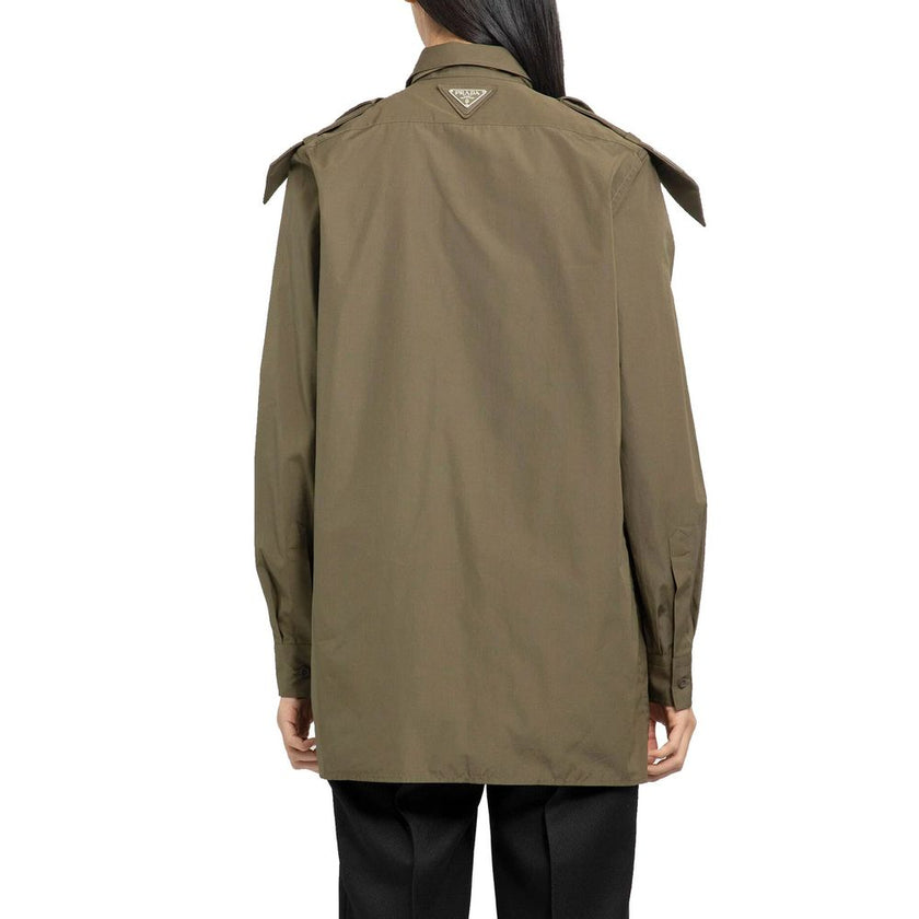 Green Cotton ShirtDescription: – Composition: 100% Cotton – Long sleeves – Front button closure – Back logo detail – Shirt collar – Menswear fit – The model is 177 cm tall and wears size IT 38 – Camouflage green – Epaulettes – Made in Italy – Gender: WOME