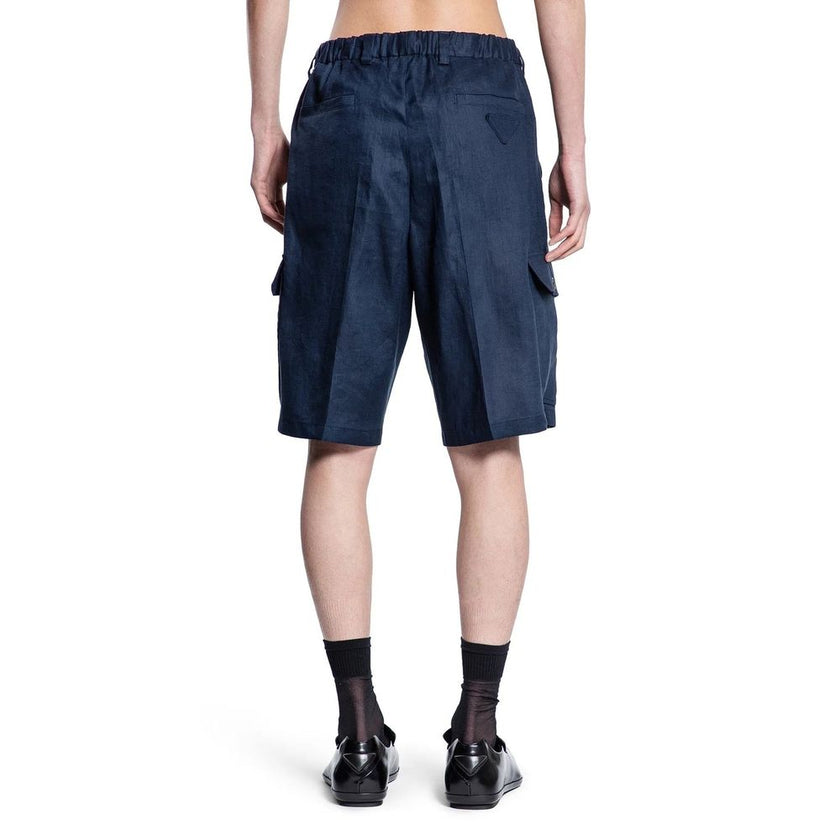 Blue Linen Bermuda ShortsDescription: – Composition: 100% Linen – Elasticated waist – Two side pockets – Belt loops – Machine wash – Two back pockets – Two patch pockets – Hook and button closure – Made in Italy – Gender: MEN –Blue Linen Bermuda Shorts${t