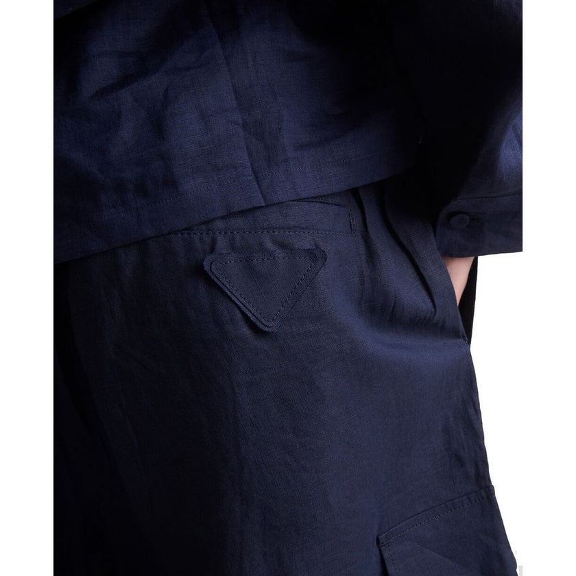 Blue Linen Bermuda ShortsDescription: – Composition: 100% Linen – Elasticated waist – Two side pockets – Belt loops – Machine wash – Two back pockets – Two patch pockets – Hook and button closure – Made in Italy – Gender: MEN –Blue Linen Bermuda Shorts${t