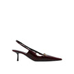 Burgundy Calfskin Mid Heel PumpsDescription: – Composition: 100% calf leather – Inner: Leather – Insole: Leather – Sole: Leather – Pointed toe – Patent effect – Elastic back insert – Branded insole – Heel 7 cm – Open back – Gold-tone metal hardware – Mid-