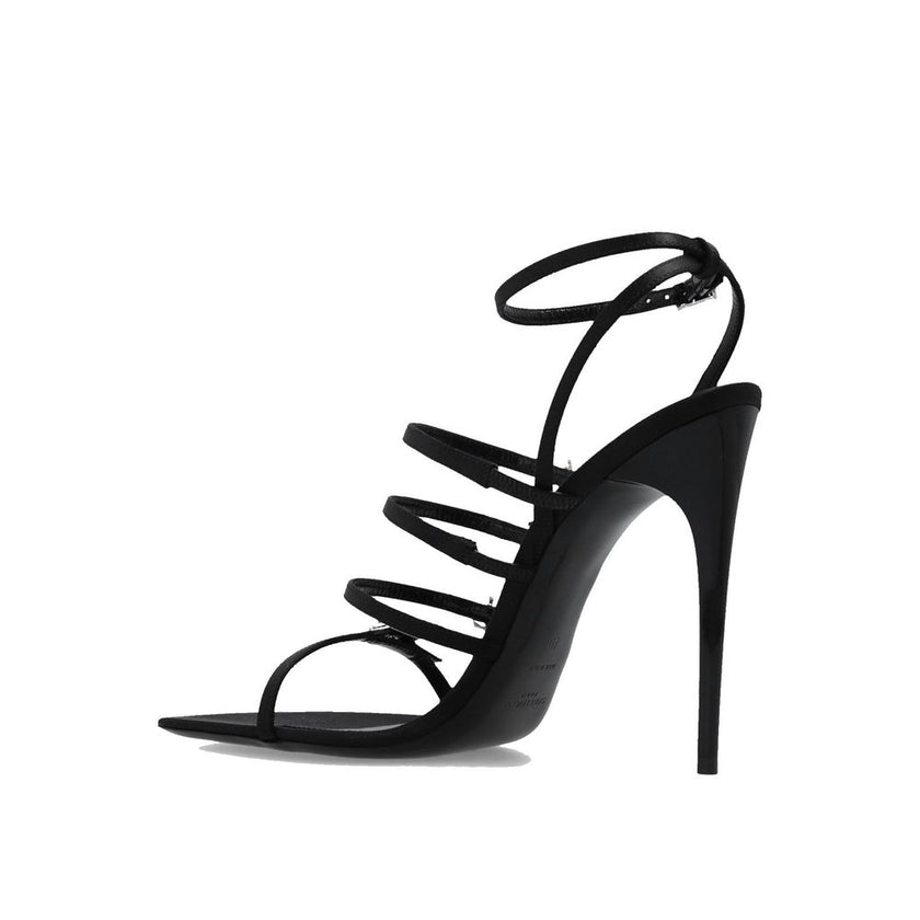 Black Silk Stiletto Heel SandalsDescription: – Composition: 100% silk – Leather insole and sole – Multi-buckle – Crystal embellishments – Iconic YSL monogram – Heel 13 cm / 5,1 in – Made in Italy –Black Silk Stiletto Heel Sandals${tagsSaint LaurentAulae J