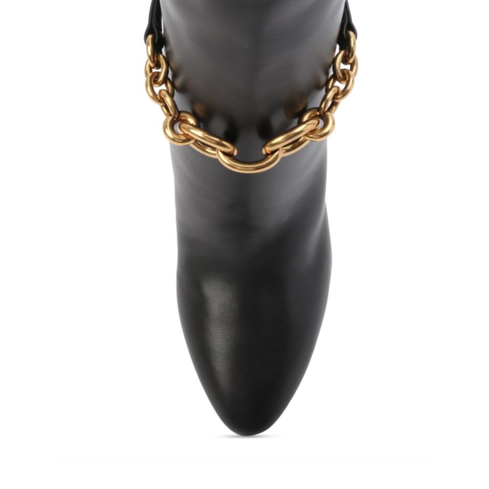Leather BootsDescription: – Composition: 100% calf leather – Leather lining, insole, sole – Slip on – Pointed toe – Gold tone chain detail – Buckle detail – Heel 10 cm / 3,93 in – Made in Italy –Leather Boots${tagsSaint LaurentAulae Leather Boots Saint La