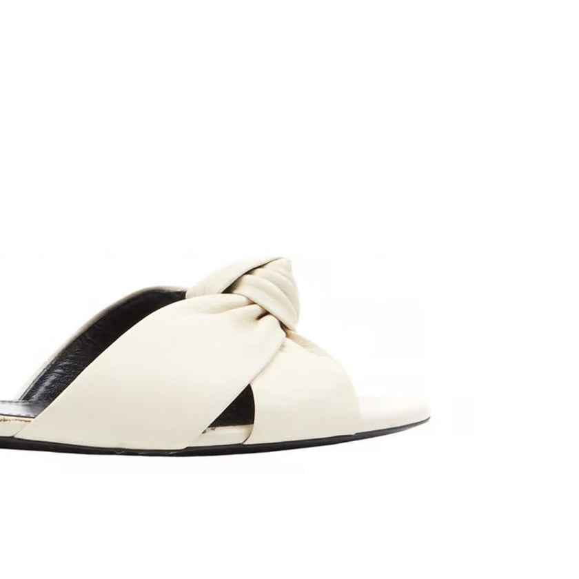 White Calfskin SlidesDescription: – Composition: 100% calf leather – leather insole and sole – open back – open toe – round toe – branded insole – made in Italy –White Calfskin Slides${tagsSaint LaurentAulae Leather Slides Saint LaurentAulae Leather Slide