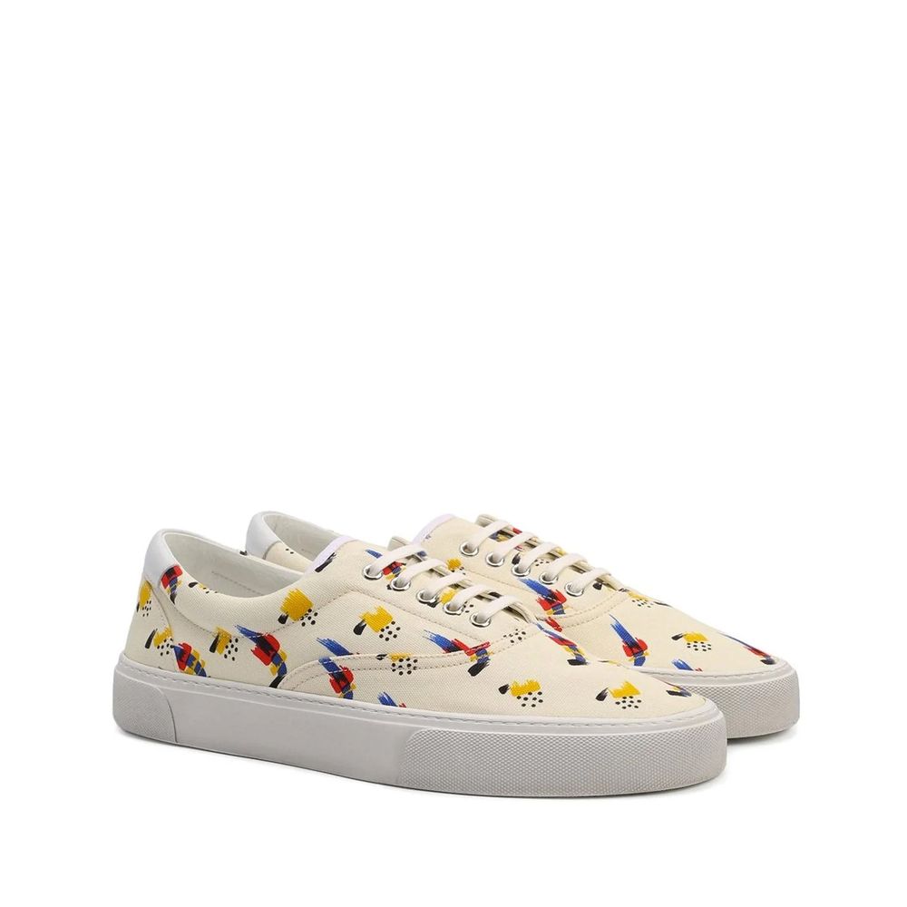 White Canvas Low Top SneakersDescription: – Composition: 100% Canvas – Inner: Canvas – Insole: Leather – Sole: Rubber – Round toe – Front lace-up closure – Made in Italy – Gender: MEN –White Canvas Low Top Sneakers${tagsSaint LaurentAulae Printed Canvas S