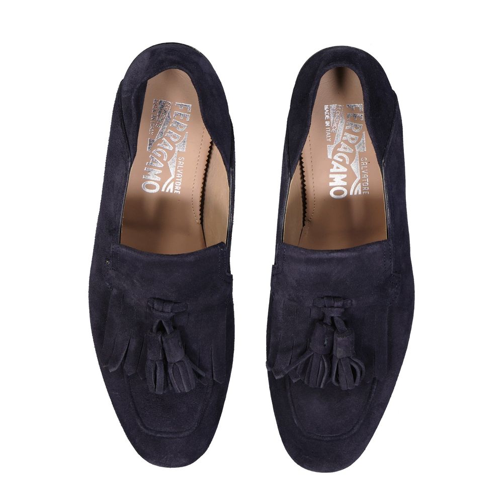 Blue Calfskin Slip-On LoafersDescription: – Composition: 100% calf leather – Inner: Leather – Insole: Leather – Sole: Rubber – Round toe – Slip on – Fringe top details – Made in Italy – Gender: MEN –Blue Calfskin Slip-On Loafers${tagsSalvatore FerragamoAu