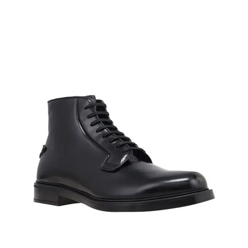 Black Calfskin Lace-Up BootsDescription: – Composition: 100% calf leather – Inner: Leather – Insole: Leather – Sole: Rubber – Round toe – Back logo detail – Front lace-up closure – Made in Italy – Gender: MEN –Black Calfskin Lace-Up Boots${tagsPradaAulae