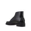Black Calfskin Lace-Up BootsDescription: – Composition: 100% calf leather – Inner: Leather – Insole: Leather – Sole: Rubber – Round toe – Back logo detail – Front lace-up closure – Made in Italy – Gender: MEN –Black Calfskin Lace-Up Boots${tagsPradaAulae
