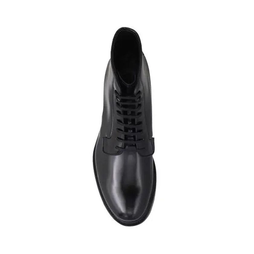 Black Calfskin Lace-Up BootsDescription: – Composition: 100% calf leather – Inner: Leather – Insole: Leather – Sole: Rubber – Round toe – Back logo detail – Front lace-up closure – Made in Italy – Gender: MEN –Black Calfskin Lace-Up Boots${tagsPradaAulae