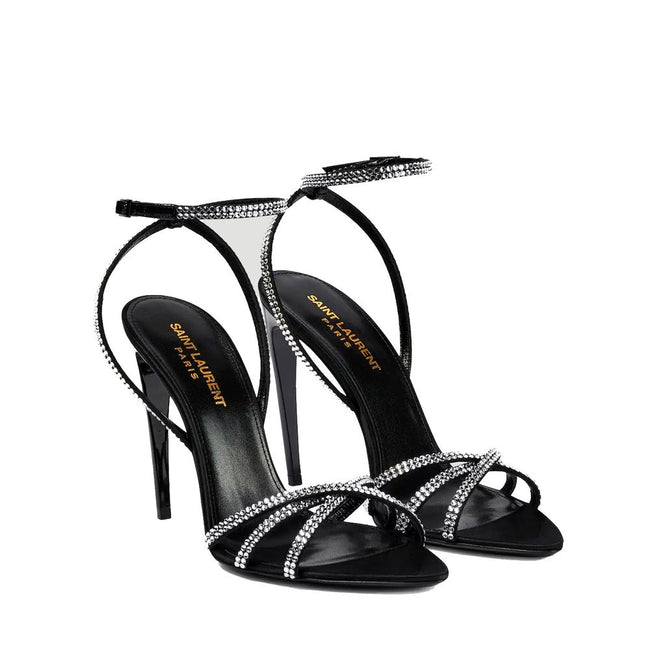 Black Silk Stiletto Heel SandalsDescription: – Composition: 100% Silk – Inner: 100% Leather – Insole: 100% Leather – Sole: 100% Leather – Ankle side buckle fastening – Almond toe – Rhinestones crisscrossed straps – Heel hight: 10.5 cm – Made in Italy – Ge