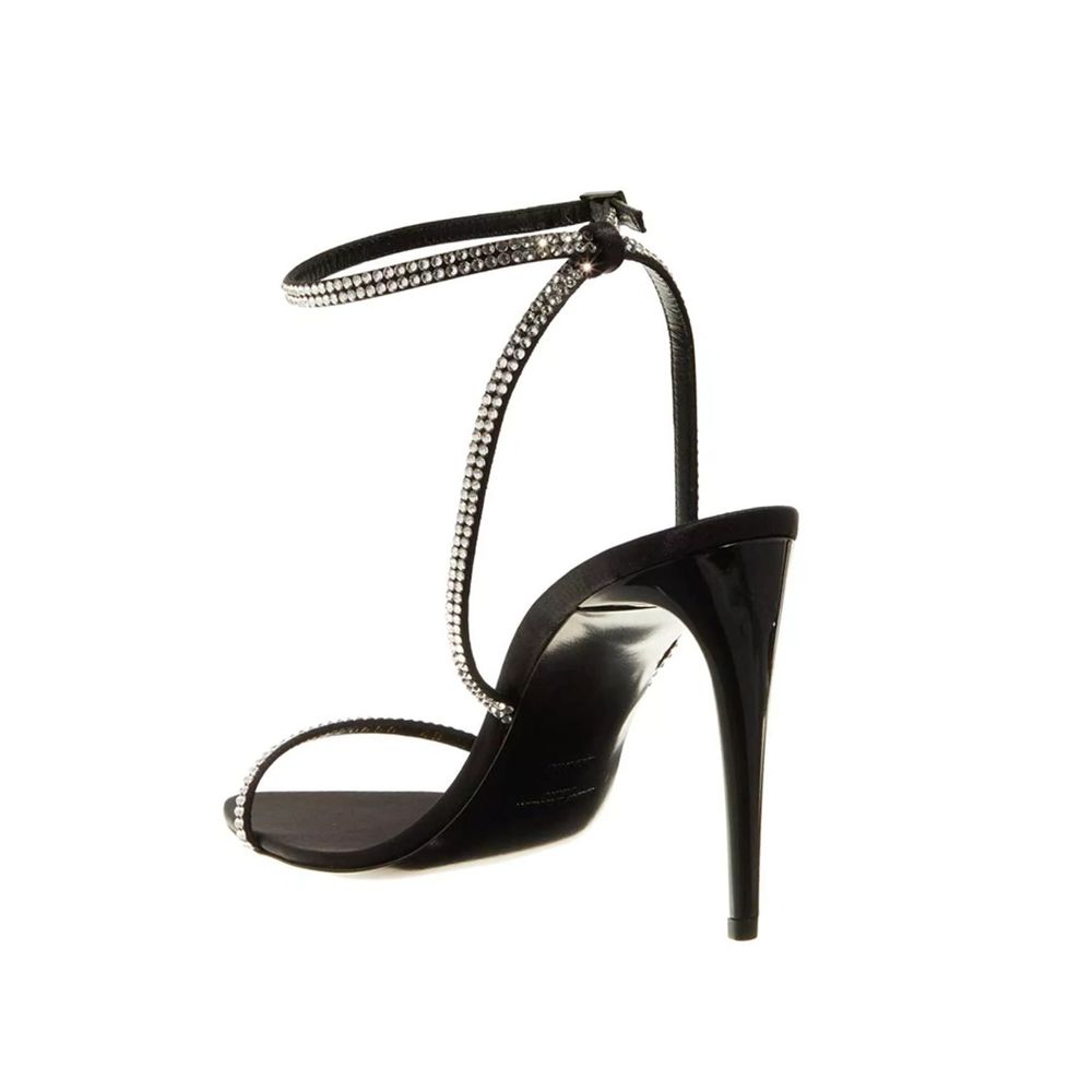 Black Silk Stiletto Heel SandalsDescription: – Composition: 100% Silk – Inner: 100% Leather – Insole: 100% Leather – Sole: 100% Leather – Ankle side buckle fastening – Almond toe – Rhinestones crisscrossed straps – Heel hight: 10.5 cm – Made in Italy – Ge
