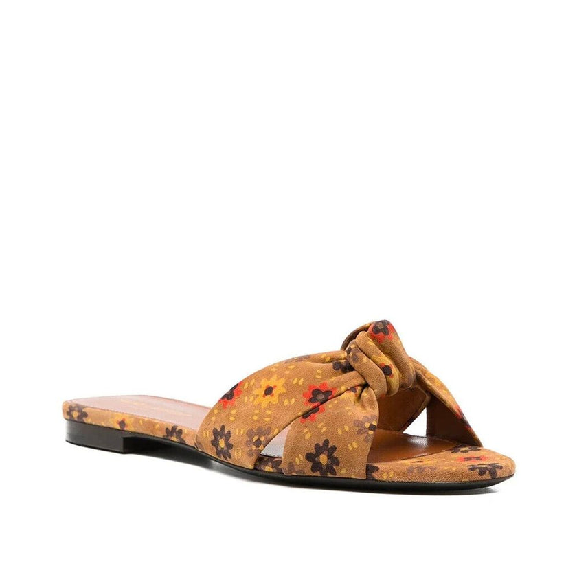 Brown Leather SlidesDescription: – Composition: 100% leather – Leather lining, insole, sole – Branded insole – Made in Italy –Brown Leather Slides${tagsSaint LaurentAulae Bianca Knotted Suede Slides Saint LaurentAulae Bianca Knotted Suede Slides Descripti