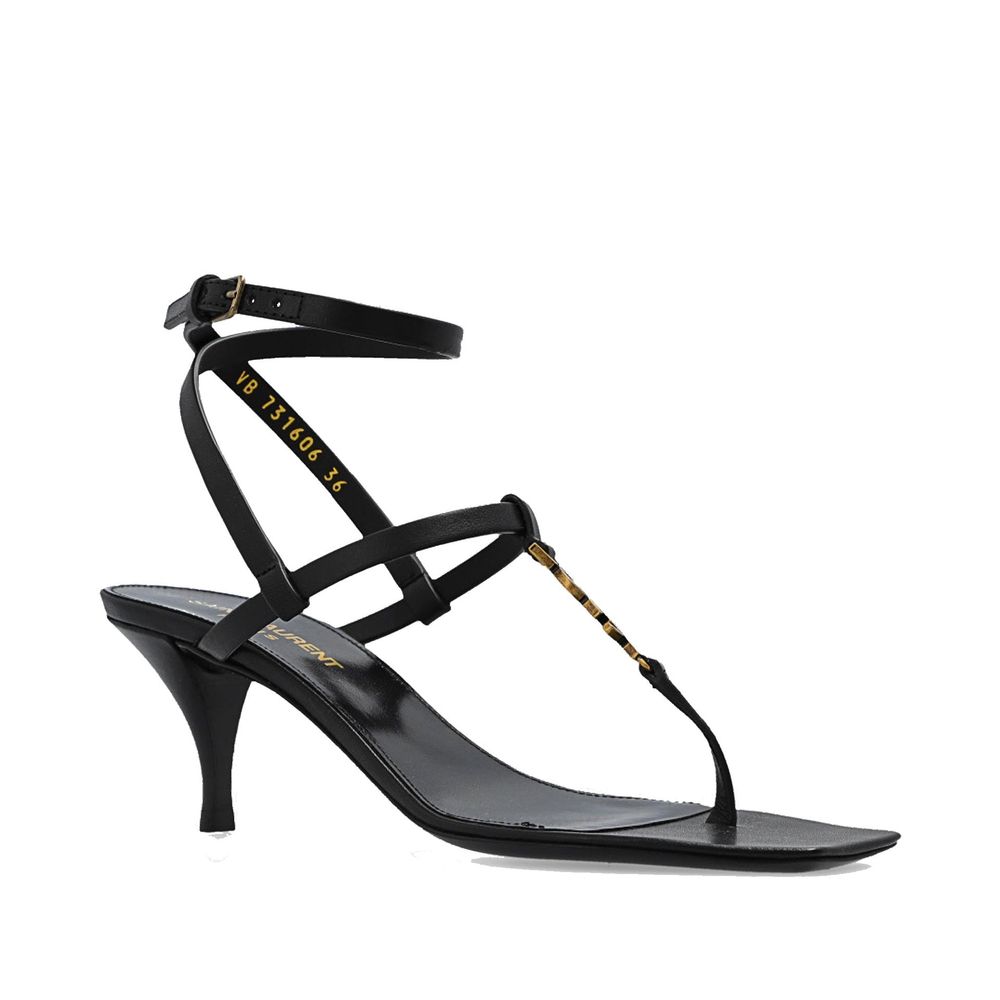 Black Calfskin Stiletto Heel SandalsDescription: – Composition: 100% calf leather – Leather lining, insole, sole – Ankle side buckle fastening – Square toe – Iconic YSL monogram – Heel 6 cm / 2,3 in – Made in Italy –Black Calfskin Stiletto Heel Sandals${t