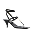 Black Calfskin Stiletto Heel SandalsDescription: – Composition: 100% calf leather – Leather lining, insole, sole – Ankle side buckle fastening – Square toe – Iconic YSL monogram – Heel 6 cm / 2,3 in – Made in Italy –Black Calfskin Stiletto Heel Sandals${t