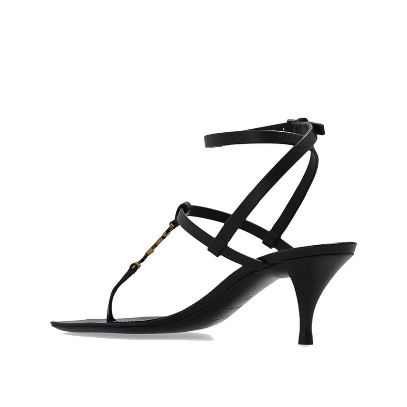 Black Calfskin Stiletto Heel SandalsDescription: – Composition: 100% calf leather – Leather lining, insole, sole – Ankle side buckle fastening – Square toe – Iconic YSL monogram – Heel 6 cm / 2,3 in – Made in Italy –Black Calfskin Stiletto Heel Sandals${t