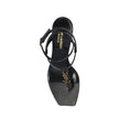 Black Calfskin Stiletto Heel SandalsDescription: – Composition: 100% calf leather – Leather lining, insole, sole – Ankle side buckle fastening – Square toe – Iconic YSL monogram – Heel 6 cm / 2,3 in – Made in Italy –Black Calfskin Stiletto Heel Sandals${t