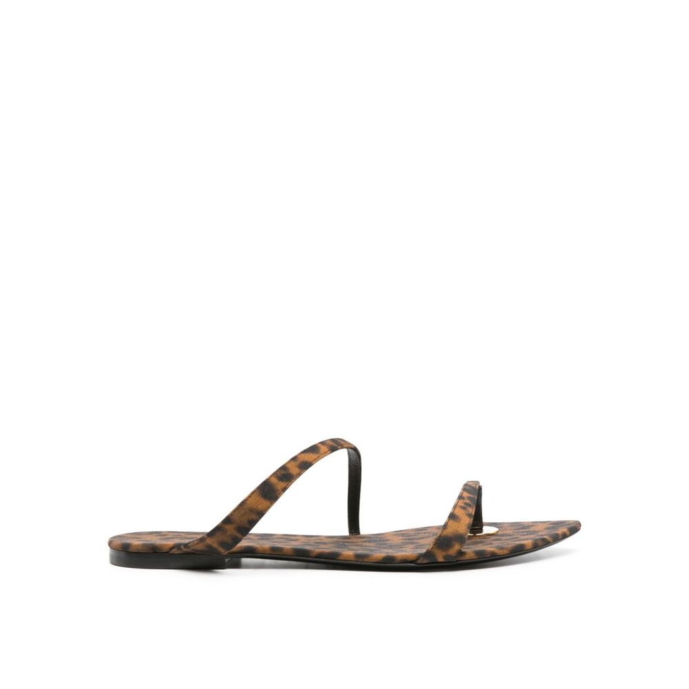 Brown Fabric Strap-On SandalsDescription: – Composition: 100% Fabric – Inner: Fabric – Insole: Fabric – Sole: Leather – Pointed toe – All-over leopard print – Slip-on design – Twill weave – Thong strap – Logo-engraved gold-tone hardware – Made in Italy –
