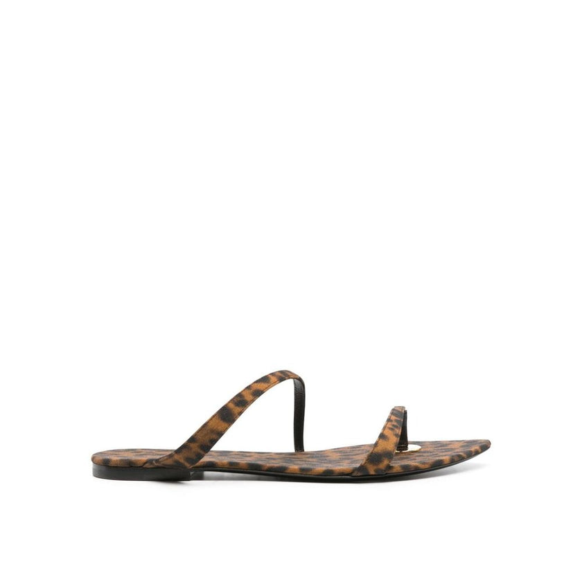 Brown Fabric Strap-On SandalsDescription: – Composition: 100% Fabric – Inner: Fabric – Insole: Fabric – Sole: Leather – Pointed toe – All-over leopard print – Slip-on design – Twill weave – Thong strap – Logo-engraved gold-tone hardware – Made in Italy –