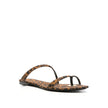 Brown Fabric Strap-On SandalsDescription: – Composition: 100% Fabric – Inner: Fabric – Insole: Fabric – Sole: Leather – Pointed toe – All-over leopard print – Slip-on design – Twill weave – Thong strap – Logo-engraved gold-tone hardware – Made in Italy –