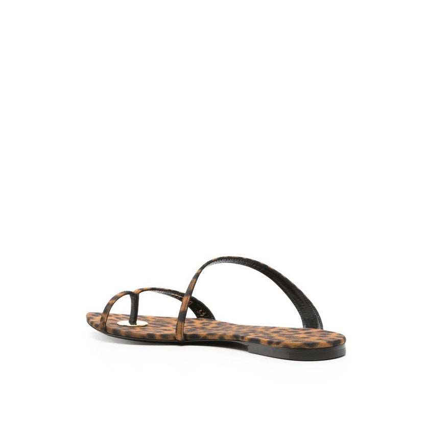 Brown Fabric Strap-On SandalsDescription: – Composition: 100% Fabric – Inner: Fabric – Insole: Fabric – Sole: Leather – Pointed toe – All-over leopard print – Slip-on design – Twill weave – Thong strap – Logo-engraved gold-tone hardware – Made in Italy –