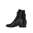 Black Calfskin Ankle BootsDescription: – Composition: 100% calf leather – Inner: Leather – Insole: Leather – Sole: Leather – Round toe – Ankle side buckle fastening – Made in Italy – Gender: MEN –Black Calfskin Ankle Boots${tagsSaint LaurentAulae Wyatt Jo
