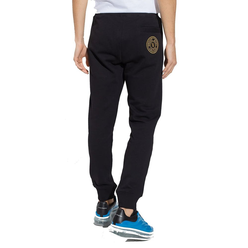 Black Cotton Joggers (Workout Pants)Description: – Composition: 100% Cotton – Elasticated waist – Two side pockets – Embroidered logo detail – Model is 193 cm tall wears size L – Made in Turkey – Gender: MEN –Black Cotton Joggers (Workout Pants)${tagsVers