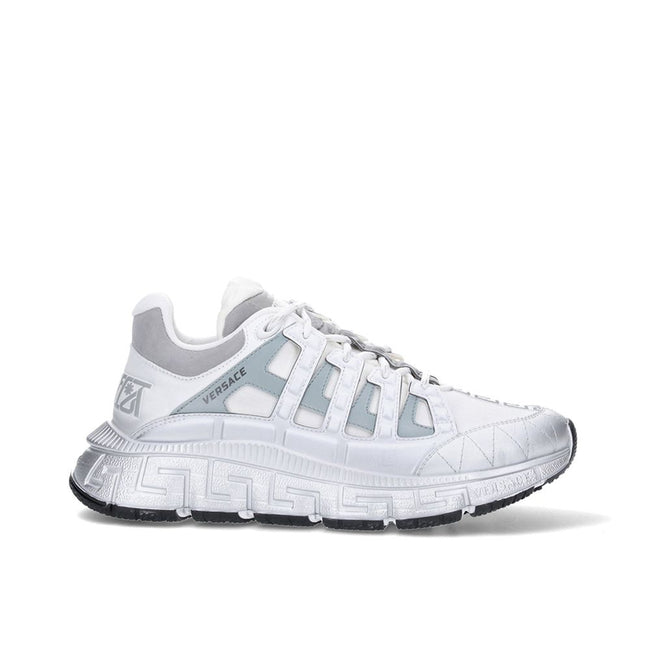 White Calfskin Athletic SneakersDescription: – Composition: 100% calf leather – Inner: Fabric – Insole: Fabric – Sole: 100% Rubber – Round toe – Lace-up fastening – Paneled design – Optical white calfskin – Distinctive logo patch detail on the tongue – Br