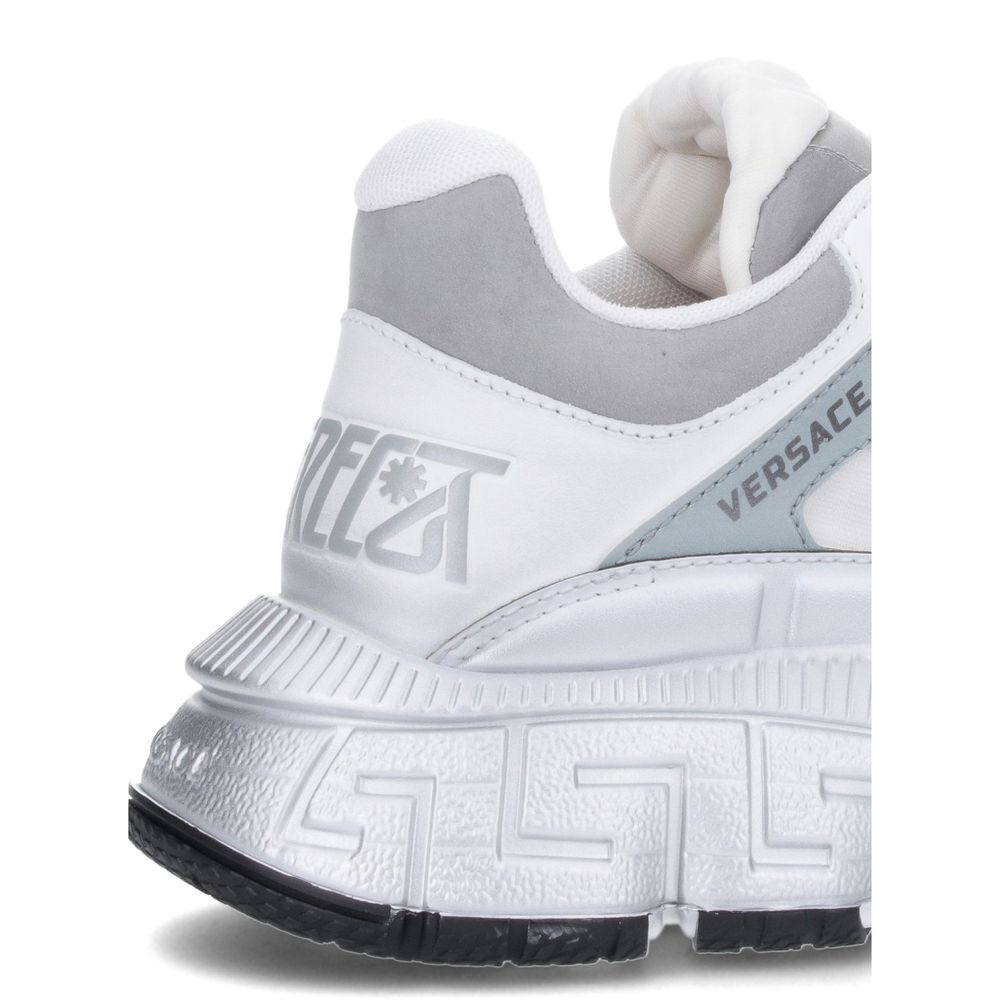 White Calfskin Athletic SneakersDescription: – Composition: 100% calf leather – Inner: Fabric – Insole: Fabric – Sole: 100% Rubber – Round toe – Lace-up fastening – Paneled design – Optical white calfskin – Distinctive logo patch detail on the tongue – Br