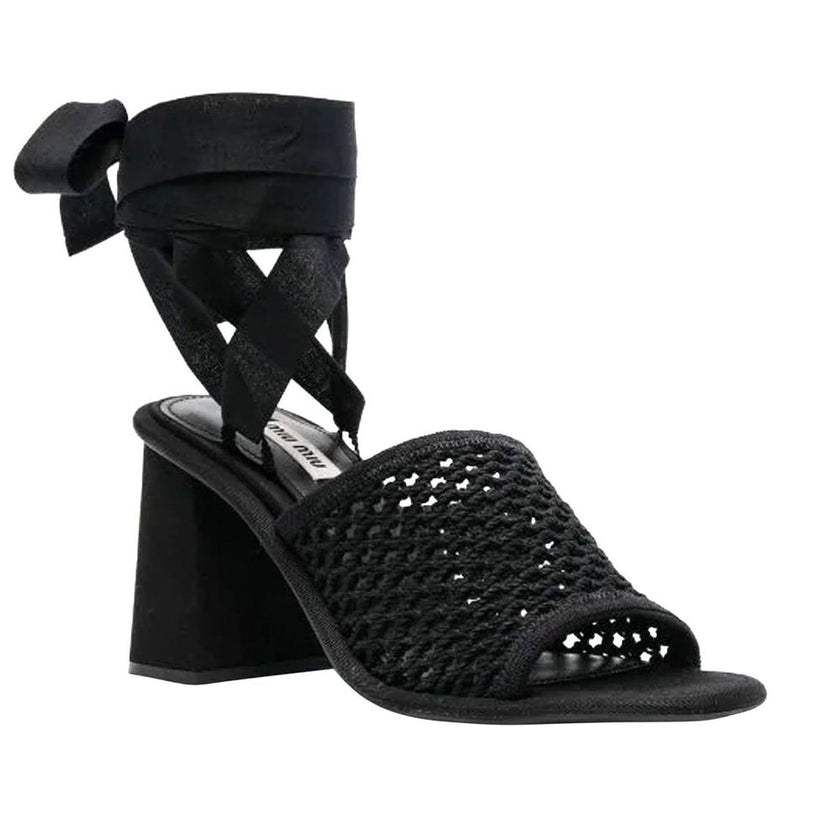 Black Fabric Strap-On SandalsDescription: – Composition: – Fabric – Leather insole – Rubber sole – Lace-up style – Branded insole – Heel 8 cm / 3,1 in – Made in Italy –Black Fabric Strap-On Sandals${tagsMiu MiuAulae Macrame Sandals Miu MiuAulae Macrame Sa
