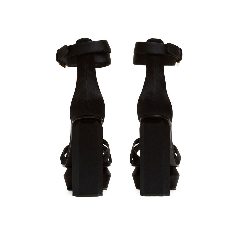 Black Silk Platform SandalsDescription: – Composition: 100% Silk – Inner: Leather – Insole: Leather – Sole: Leather – Open toe – Platform 4 cm – Adjustable ankle buckle closure – Heel 14 cm – Made in Italy – Gender: WOMEN –Black Silk Platform Sandals${tag