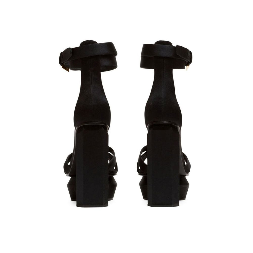 Black Silk Platform SandalsDescription: – Composition: 100% Silk – Inner: Leather – Insole: Leather – Sole: Leather – Open toe – Platform 4 cm – Adjustable ankle buckle closure – Heel 14 cm – Made in Italy – Gender: WOMEN –Black Silk Platform Sandals${tag