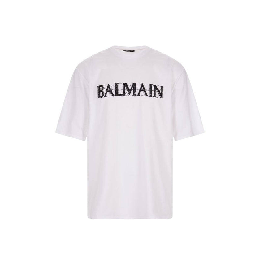 Oversize Cotton T-ShirtDescription: – Composition: 100% cotton – Short sleeves – Ribbed round neck – Crystal embellishment logo – Hand wash – Made in India –Oversize Cotton T-Shirt${tagsBalmainAulae Oversize Cotton T-Shirt BalmainAulae Oversize Cotton T-S