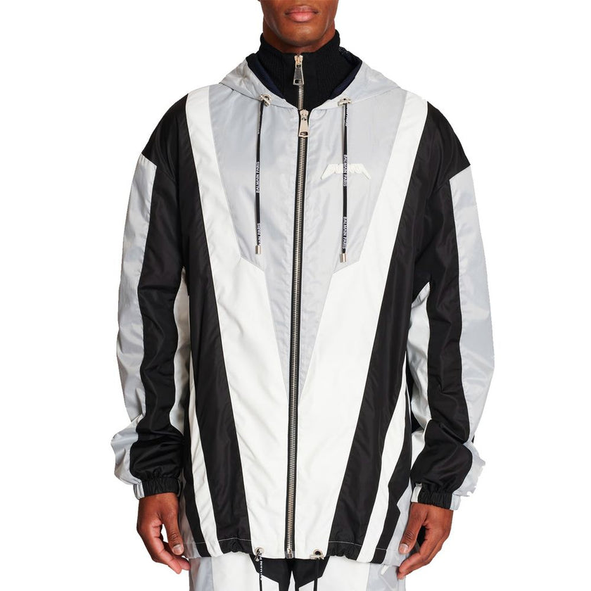 Black Polyester Shell JacketDescription: – Composition: 100% Polyester – Long sleeves – Block colour effect – Drawstring hem – Machine wash (delicate) – Front zip fastening – Hood with Balmain Paris drawstring – Made in Italy – Gender: MEN – Size & Fit: R