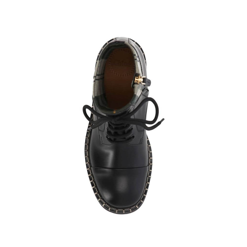 Black Cotton Lace-Up BootsDescription: – Composition: 35% Cotton 65% Polyester – Inner: Cotton – Insole: Leather – Sole: Rubber – Heel: 3.0 cm / 7.62 in – side zip closure – branded insole – Round toe – Made in Italy – Lace-up – Gender: WOMEN –Black Cotto