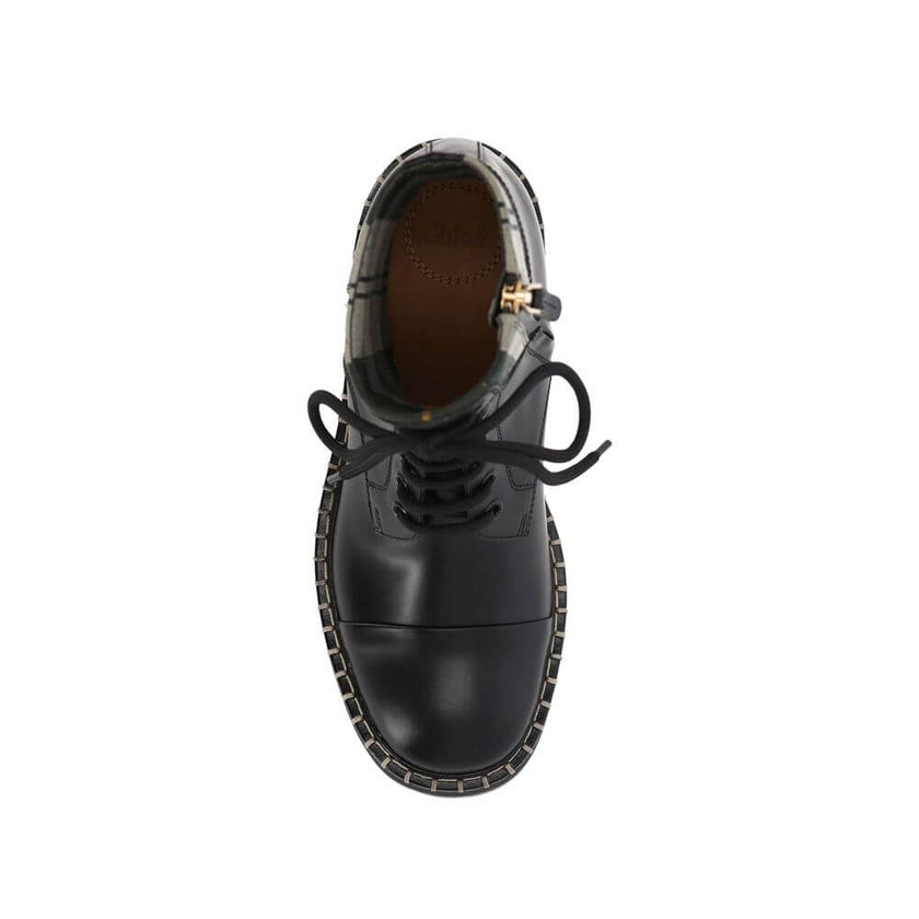 Black Cotton Lace-Up BootsDescription: – Composition: 35% Cotton 65% Polyester – Inner: Cotton – Insole: Leather – Sole: Rubber – Heel: 3.0 cm / 7.62 in – side zip closure – branded insole – Round toe – Made in Italy – Lace-up – Gender: WOMEN –Black Cotto