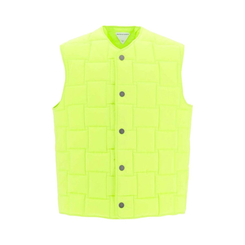 Green Polyamide Sleveless JacketDescription: – Composition: 100% Polyamide – Long sleeves – Padded design – Machine wash (delicate) – Press-stud button fastening – Made in Italy – Gender: MEN – Size & Fit: Model is 1.87 m wearing size LGreen Polyamide Sle