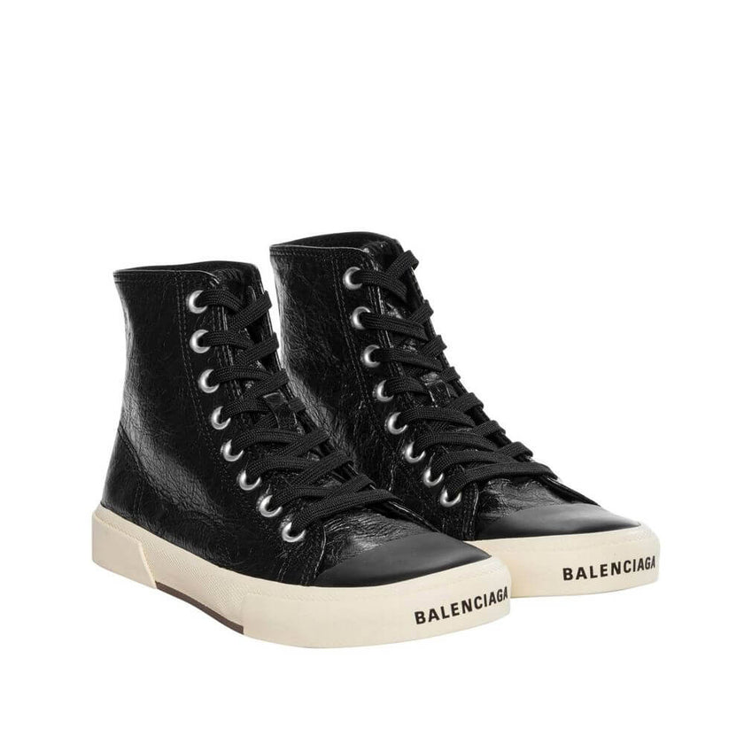 Black Calfskin High Top SneakersDescription: – Composition: 100% calf leather – Canvas Lining – Rubber sole – Rounded toe – Lace-up fastening – Contrast logo detail – Made in Italy –Black Calfskin High Top Sneakers${tagsBalenciagaAulae Paris Leather Sneak