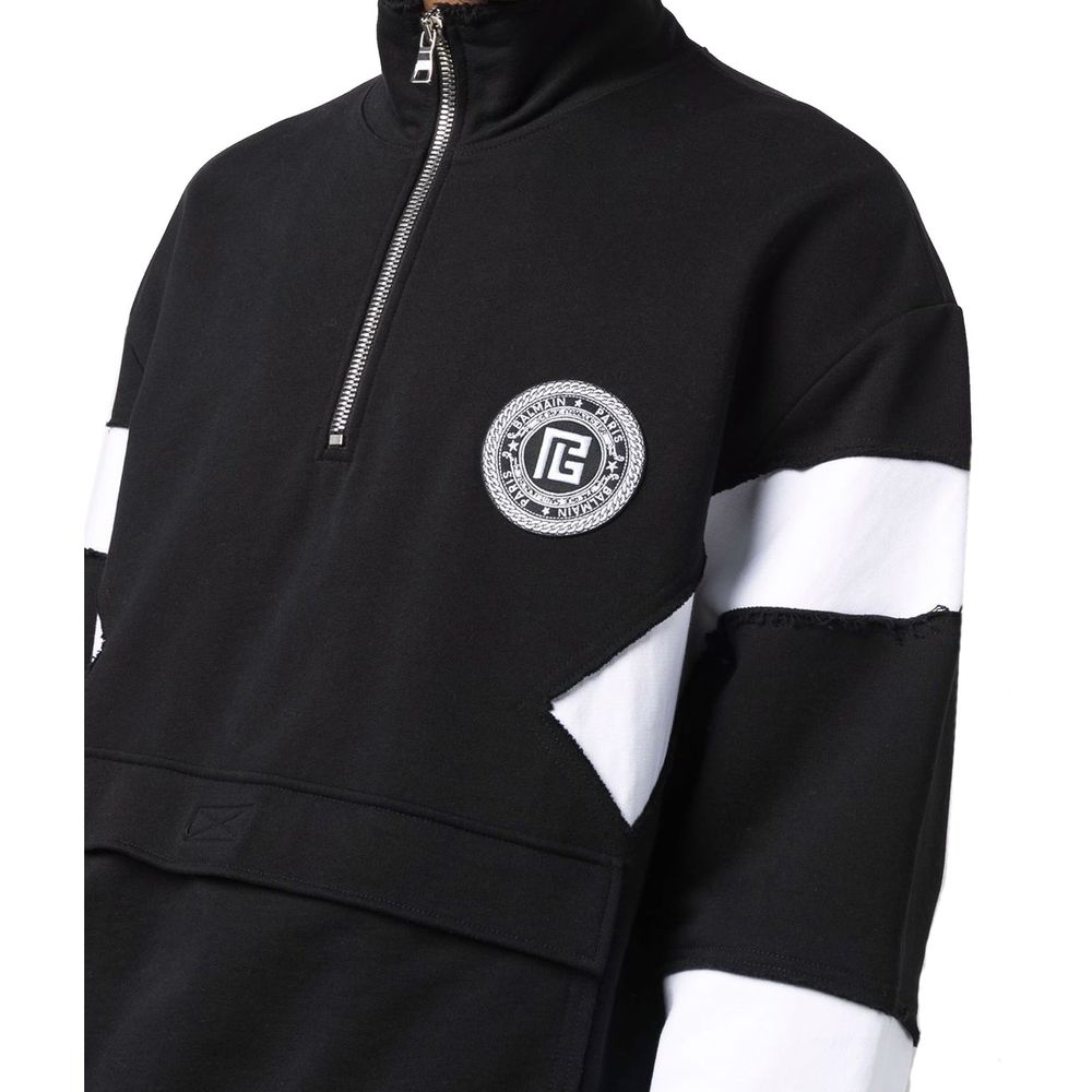 Black Cotton SweatshirtDescription: – Composition: 100% Cotton – Long sleeves – Ribbed trims – Front zip closure – Front logo detail – Machine wash (delicate) – One patch pocket – Colour block effect – Made in Italy – Gender: MEN – Size & Fit: Size in the